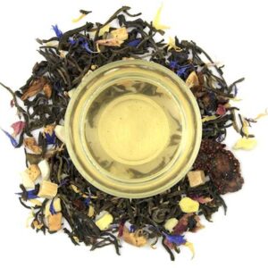 Alt text: "Gros plan sur des morceaux de fruits séchés dans le mélange de thé Fruit Storm N418